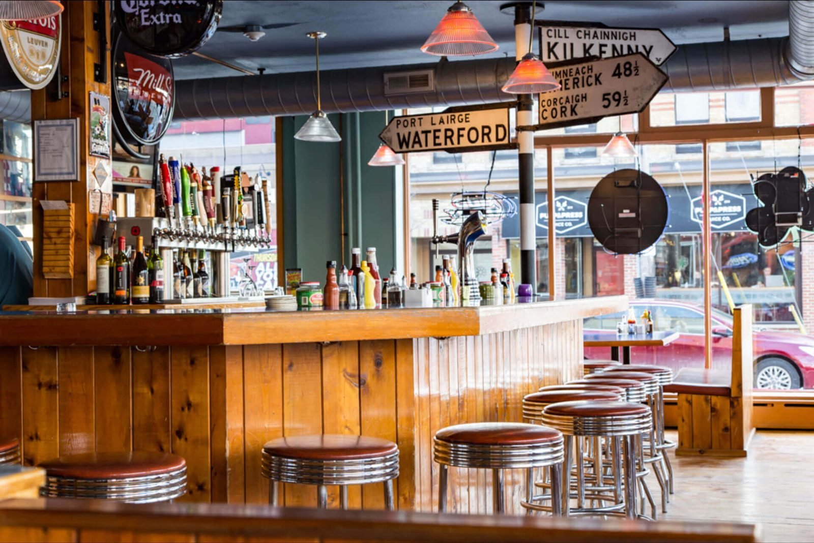 The counter and stools inside J. Dee's Market Grill